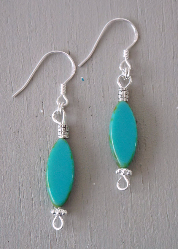 Earrings with turquoise ovals & silver spacer