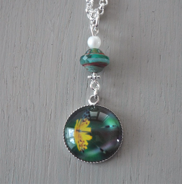 Pendant - 18mm green and yellow butterfly focal, seagreen saucer and mini pearl