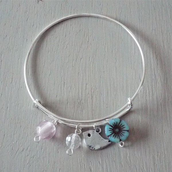 Adjustable sp bangle, birdie charm, blue & pink silverfoil beads