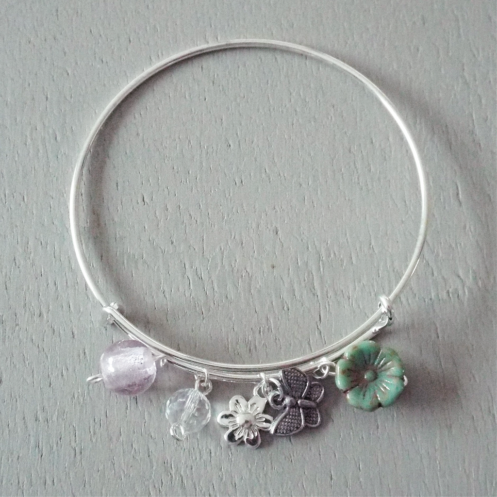 Adjustable sp bangle, butterfly & flower mini charms, green & pink silverfoil beads