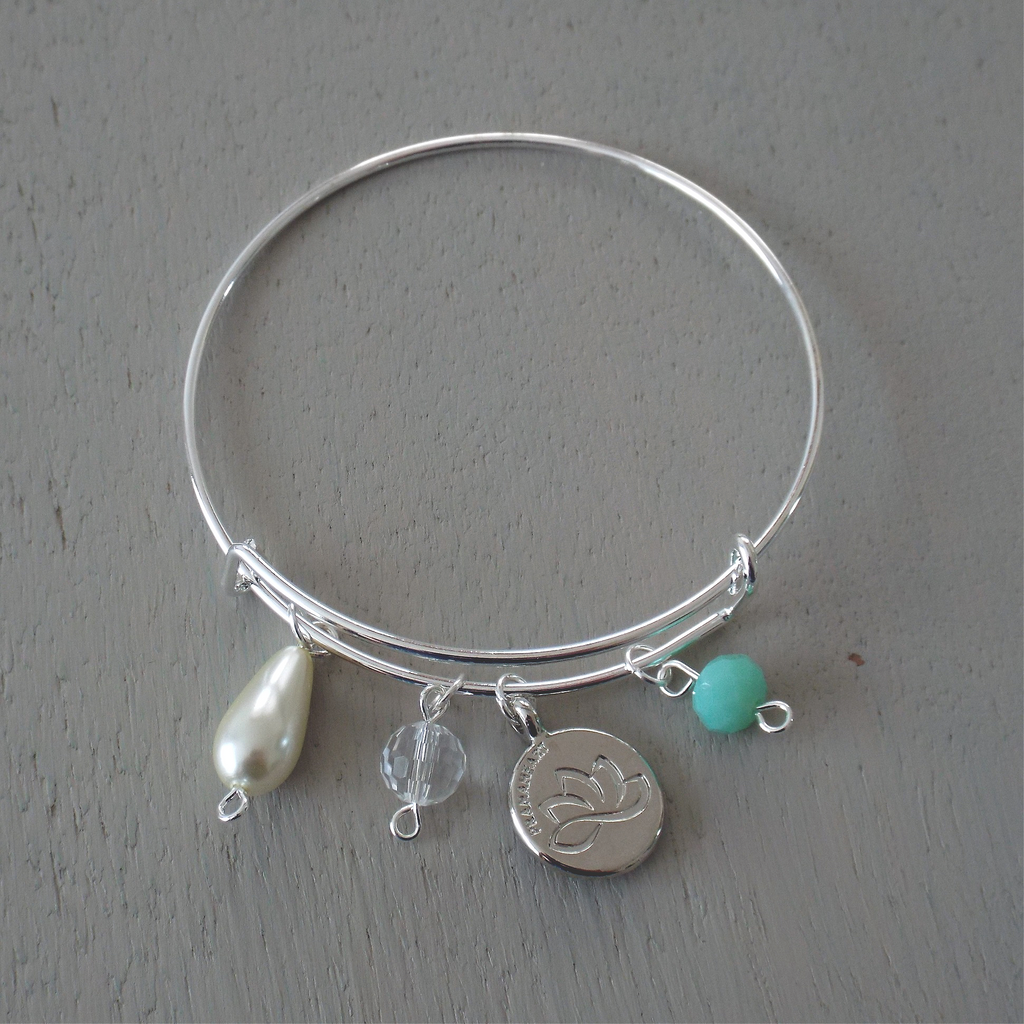 Adjustable silver plated bangle with lotus disc charm & soft mint rondelle