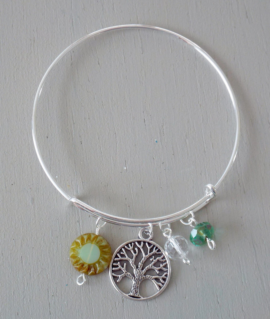 Adjustable bangle with silver plated tree-of-life charm, green beads
