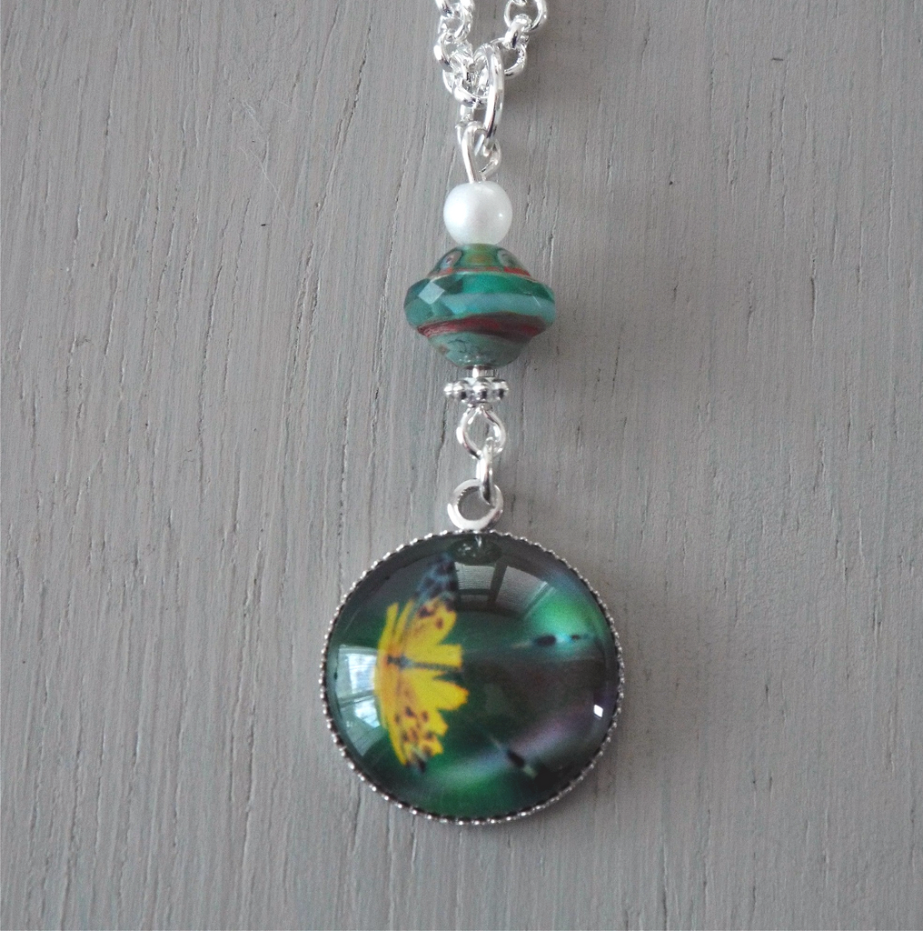 Pendant - 18mm green and yellow butterfly focal, seagreen saucer and mini pearl