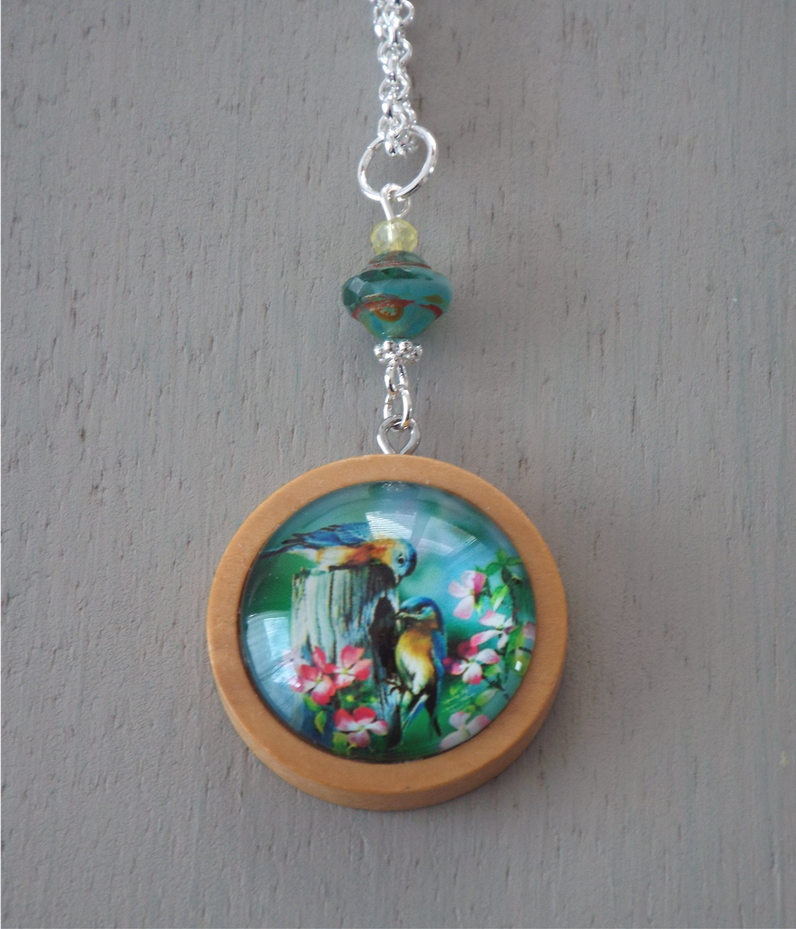 Pendant - 25mm blue and green birds focal, wooden setting, sea green beads