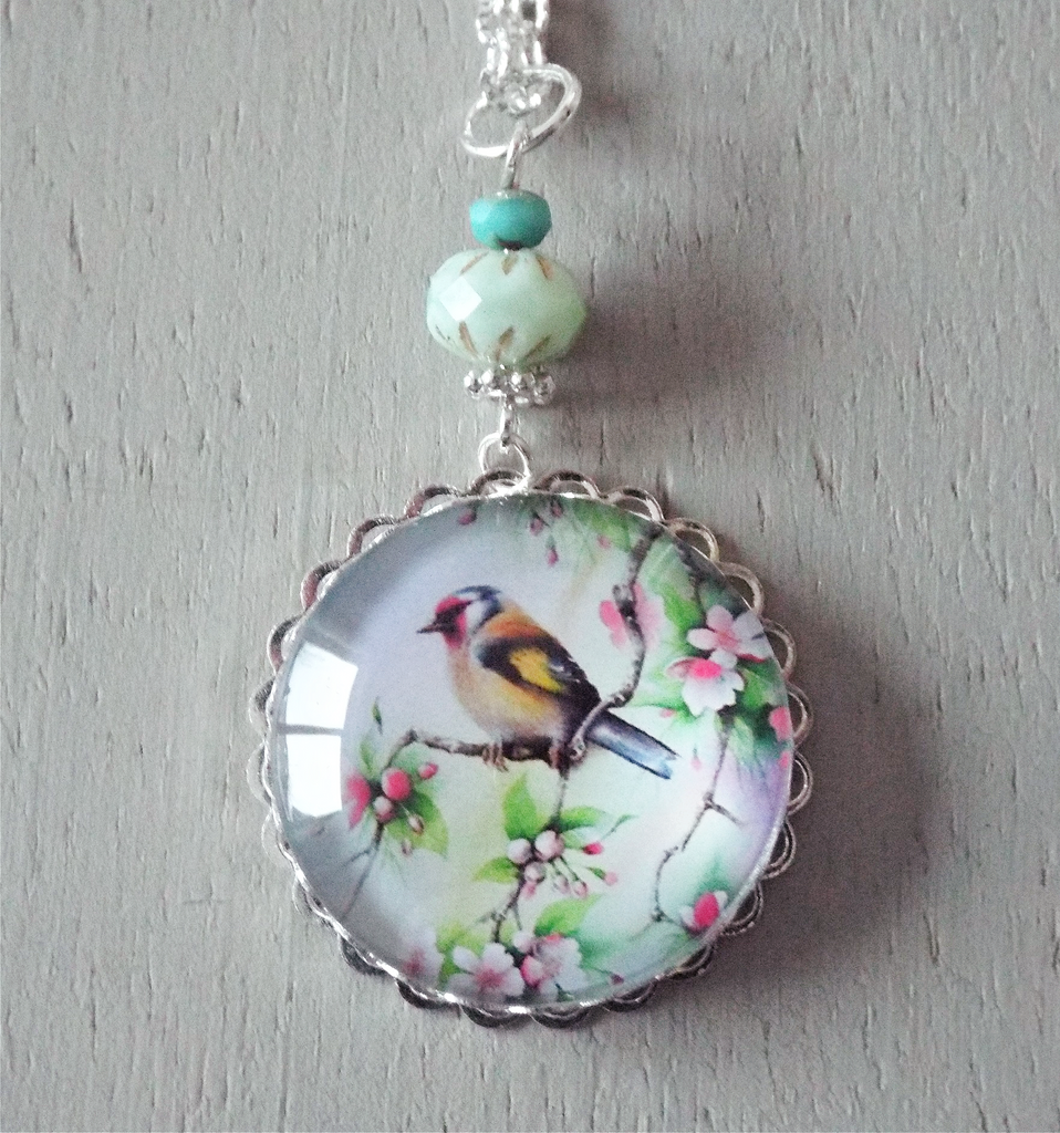 Pendant – 30mm colourful finch focal, green accents