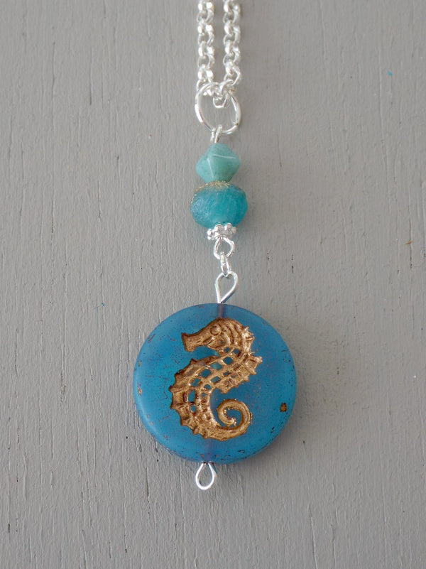 Pendant with 20mm blue gold-carved seahorse coin pendant, blue accents
