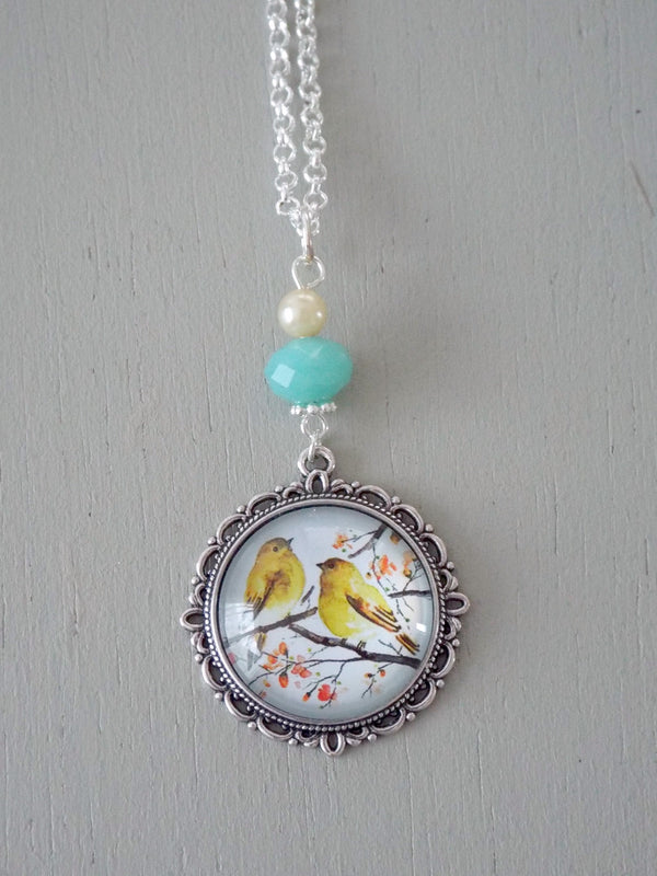 Pendant with 25mm yellow bird focal, soft turquoise rondelle / mini pearl