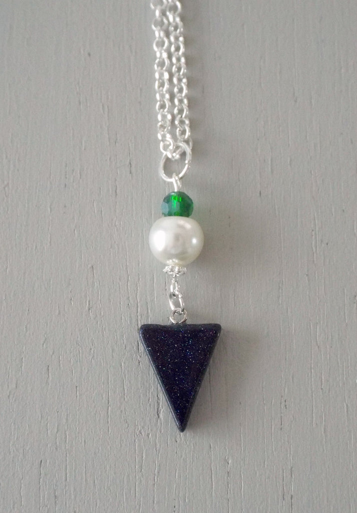 Pendant with 29x15mm blue goldstone triangle, ivory pearl / sparkly green mini